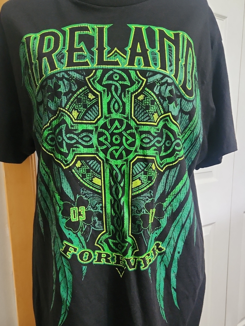 Celebrate It Black Tee with Neon Green Celtic Cross Graphic